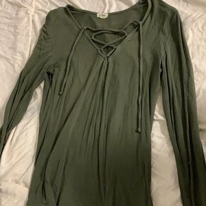 Dark green long sleeve with cross string in front